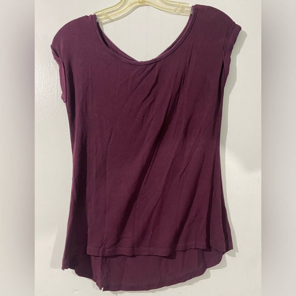 Purple shirt.